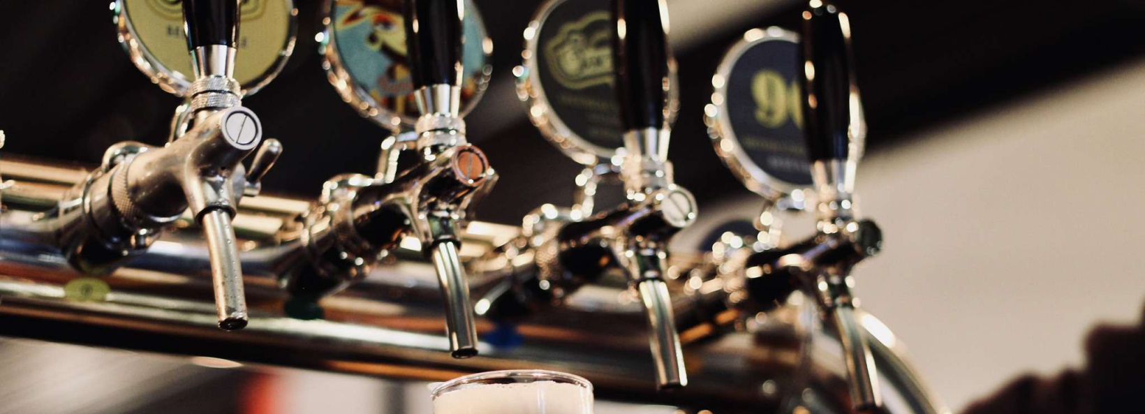 Chaplin's Cerveza Bagels & Parrilla Cover Image